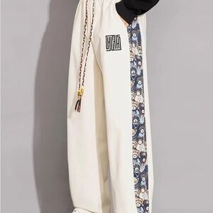 White Joggers with Embroidered Bear Sides